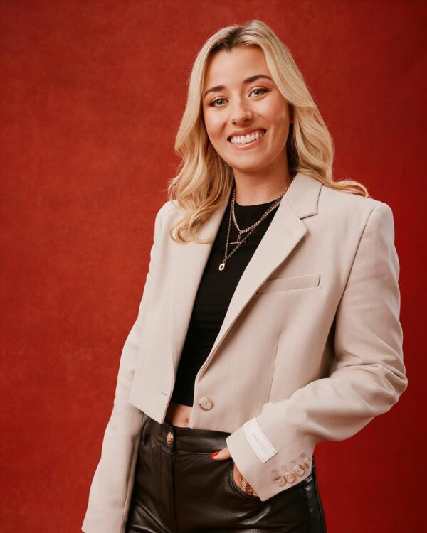 Photo by Harriet Prior on August 09 2024. May be an image of 1 person smiling bolo tie blazer jacket top and suit